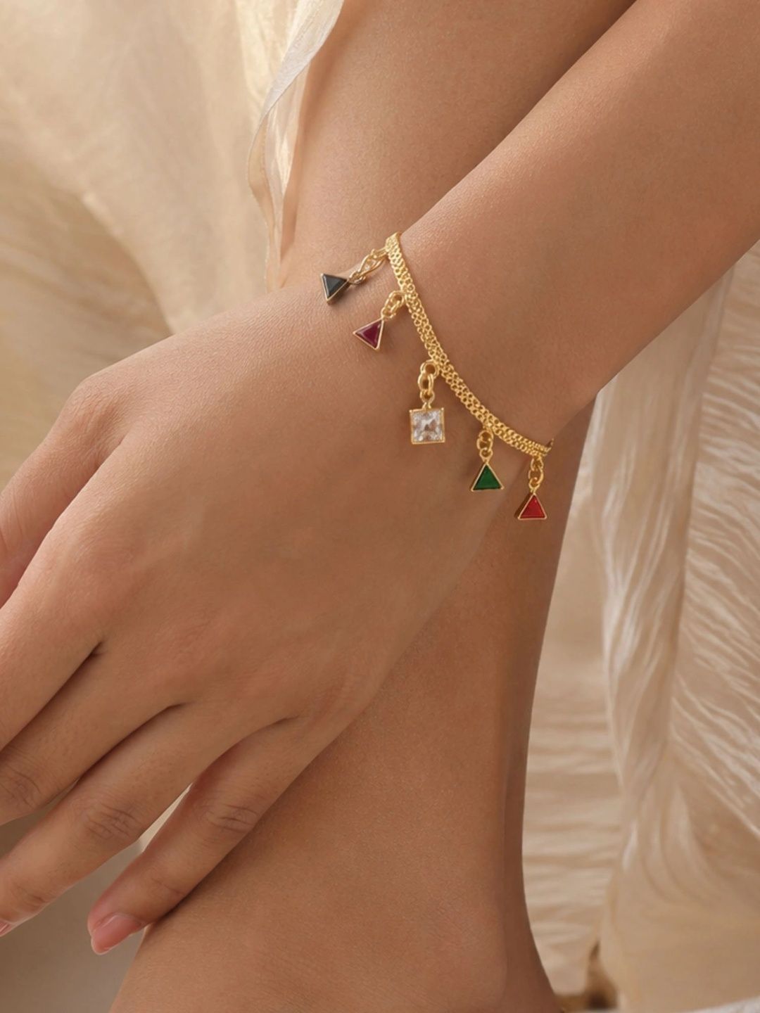Anouk Women Brass American Diamond Gold-Plated Charm Bracelet-image-46