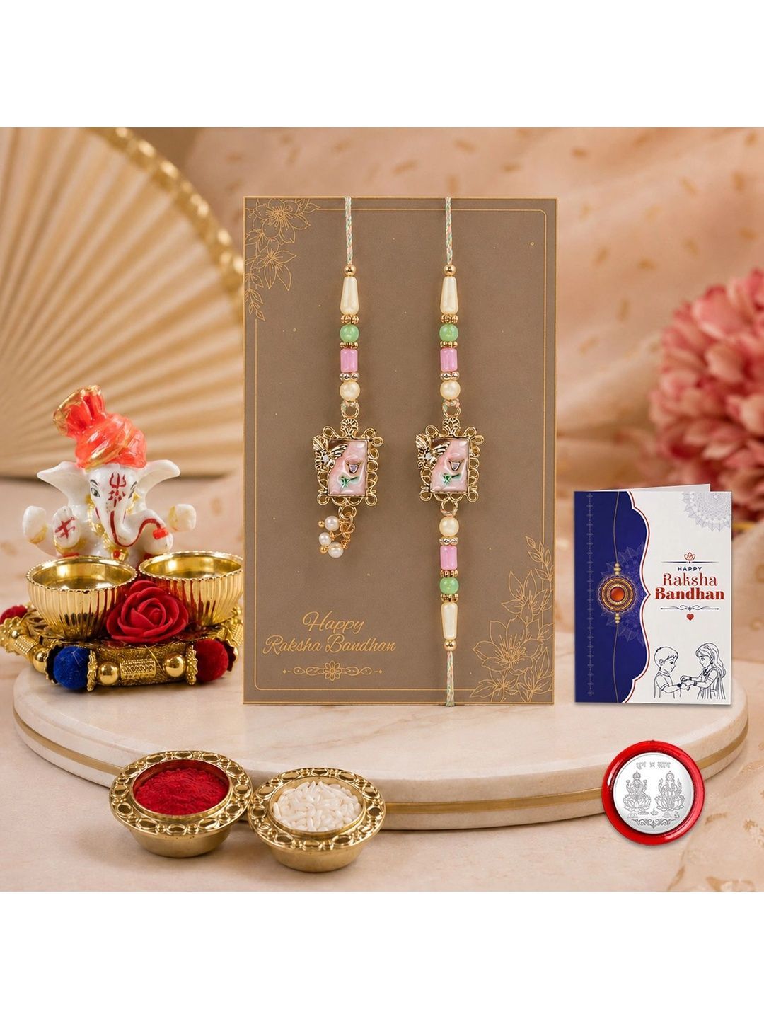 Myntra Elegant Homes 2-Pcs Rakhi With Ganesh Idol Silver Coin & Roli Chawal-picture-50