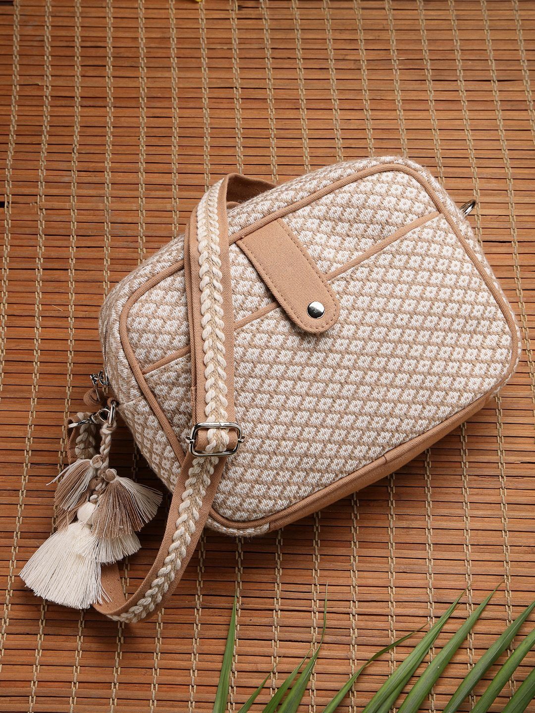 Anekaant Textured Sling Bag with Tasselled-picture-42