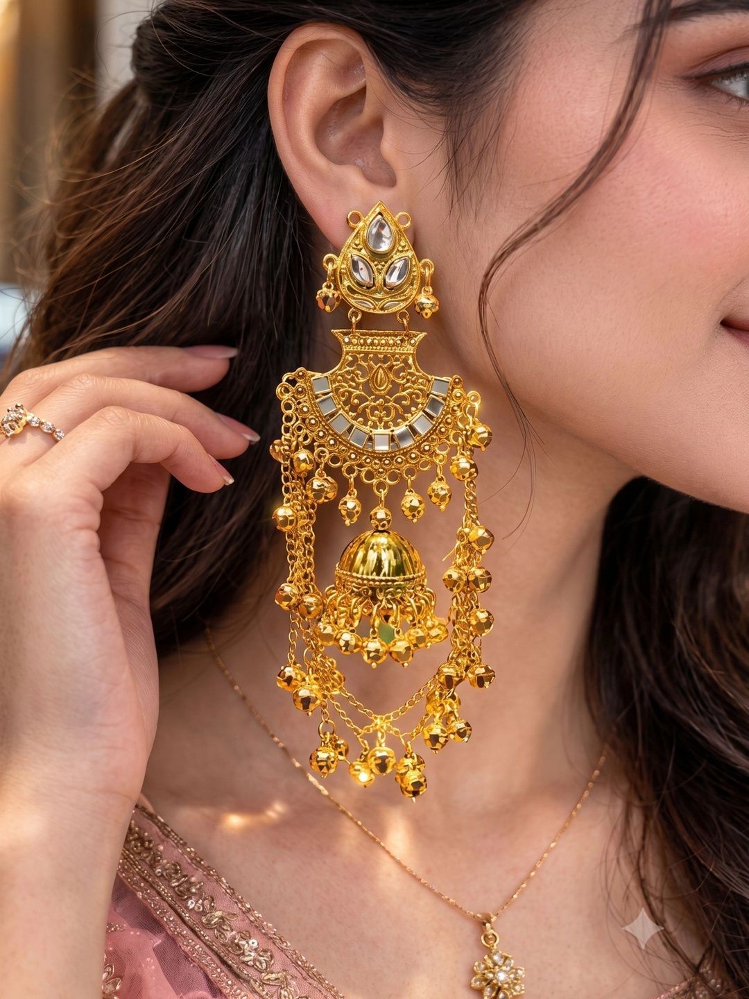 SZN Teardrop Shaped Jhumkas Earrings-image-42