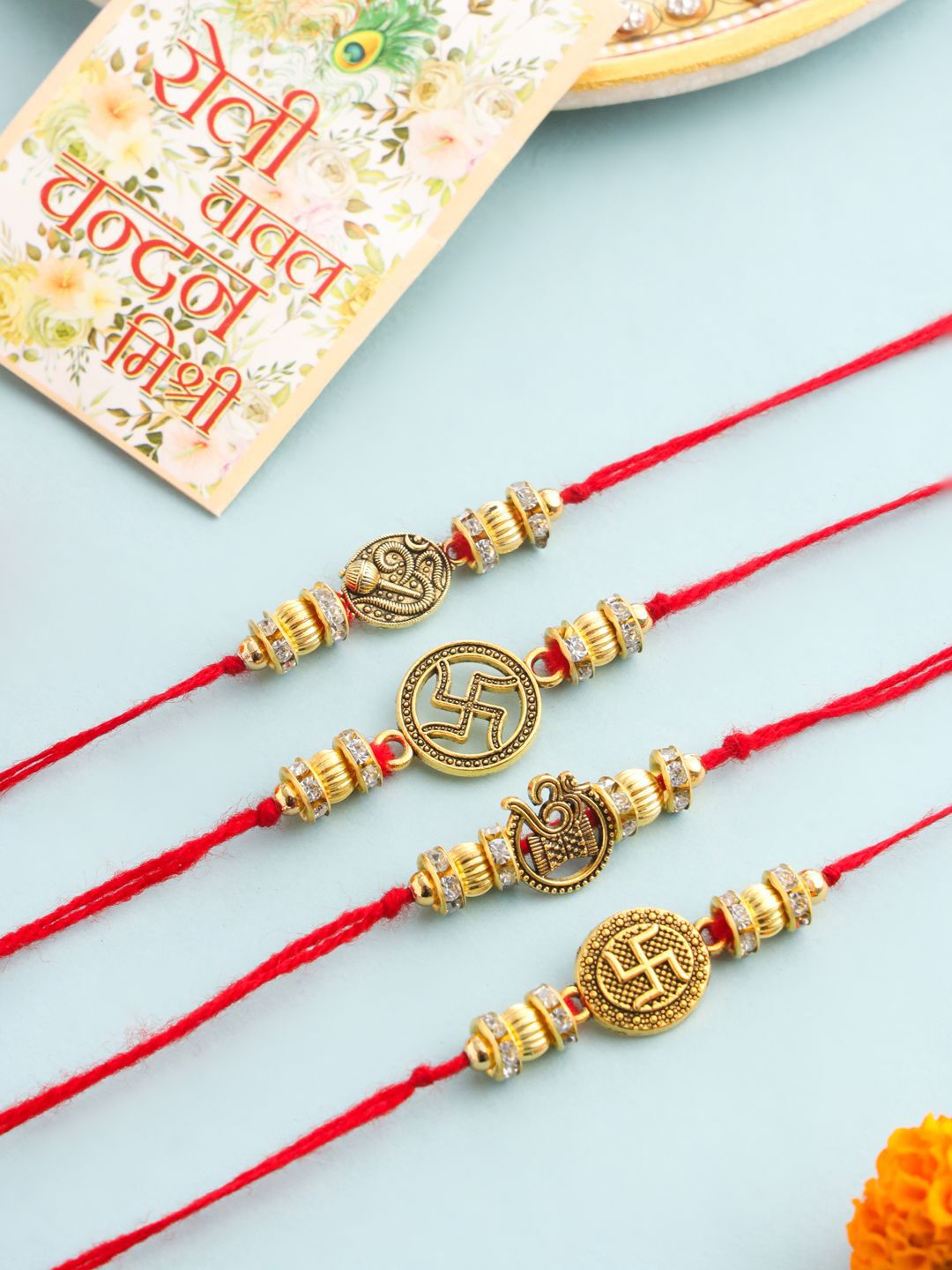 Anouk Men Set Of 4 Gold Toned Artificial Stones Swastik Design Thread Rakhi-image-48