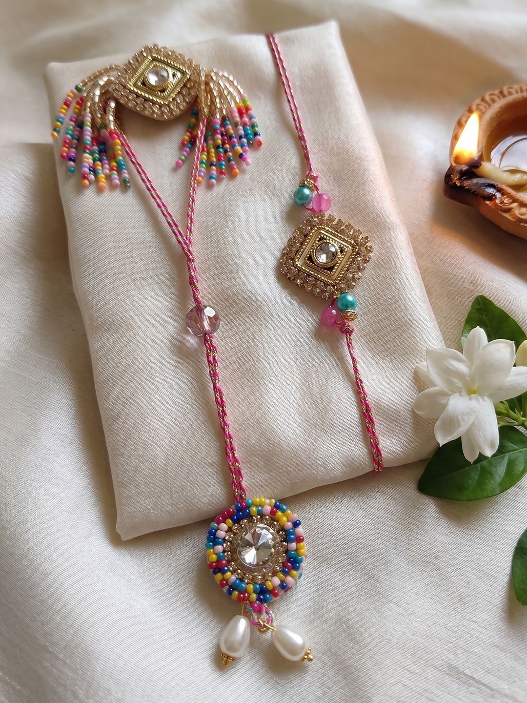 Anouk Set Of 2 White Artificial Stones Golden Toned Bhaiya Bhabhi Rakhi With Roli Chawal-picture-42