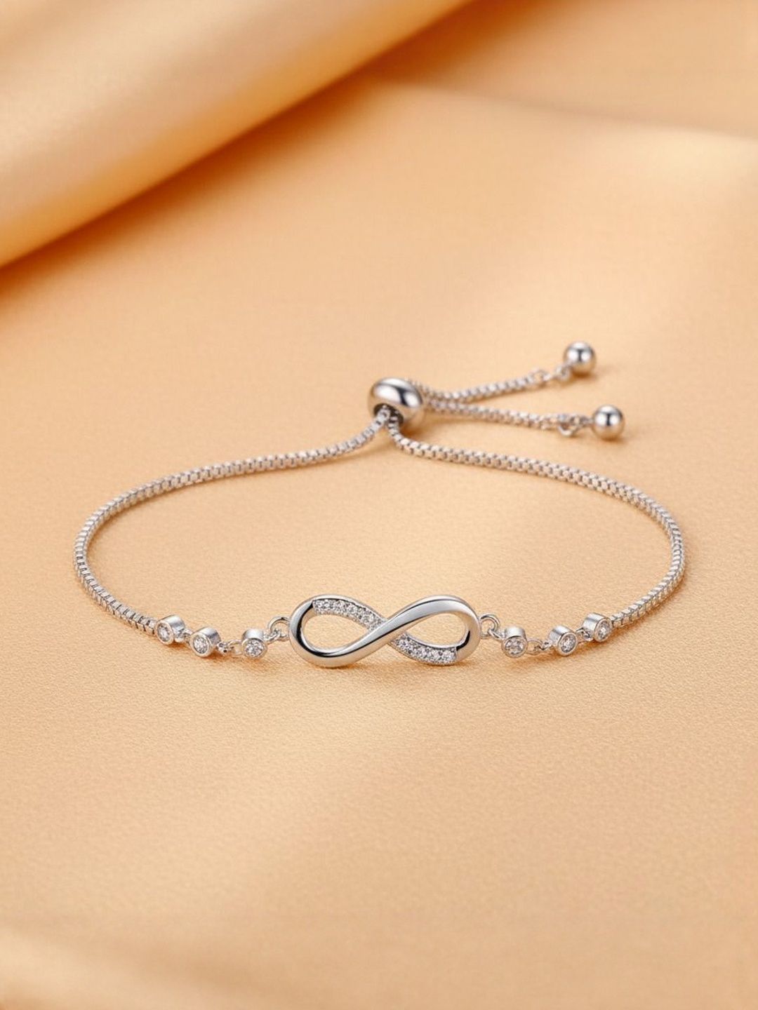 DressBerry Silver-Plated Cubic Zirconia Studded Infinity Bracelet