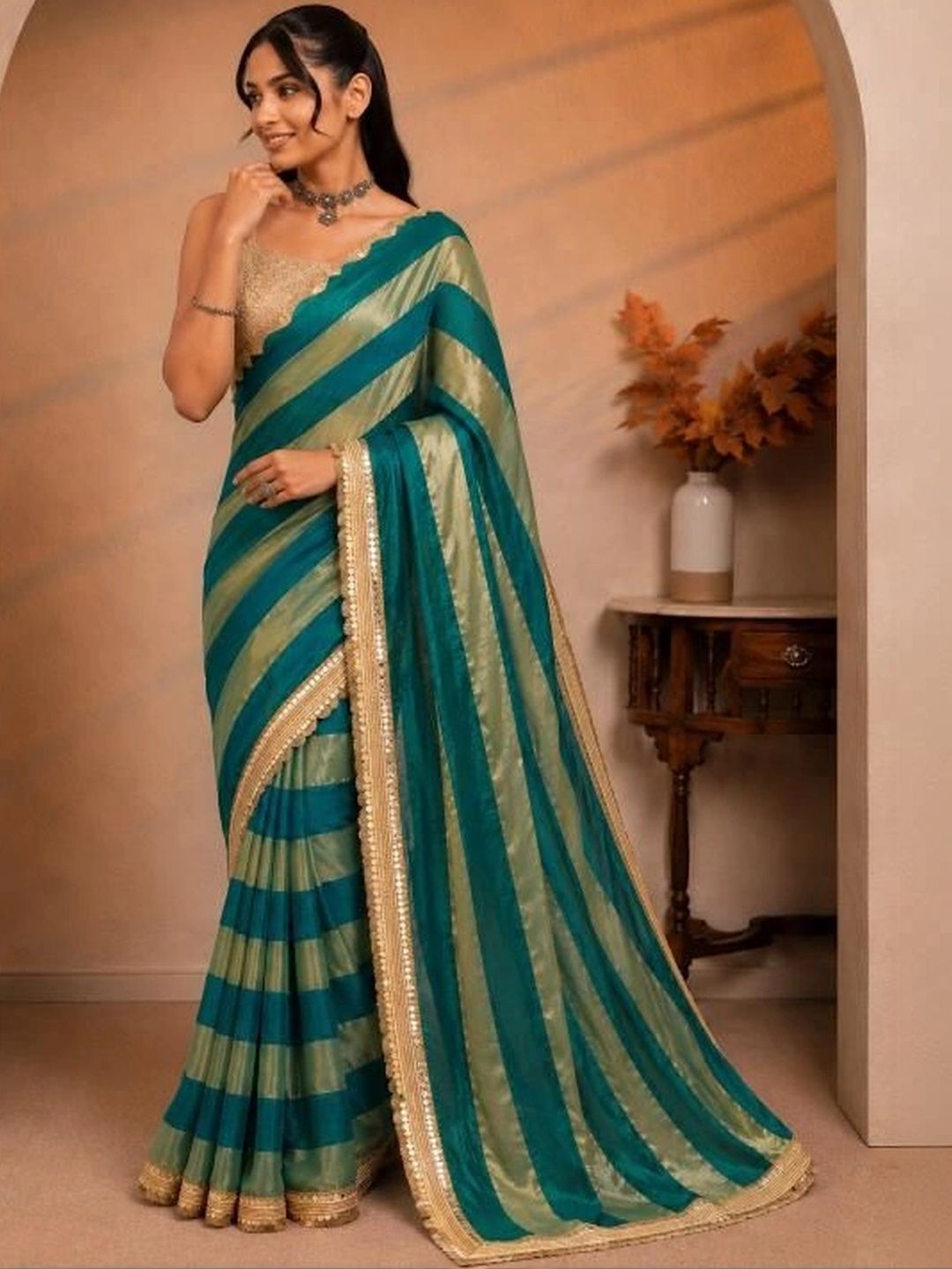 Lapetiya Clothing Striped Embroidered Tissue Saree-picture-23