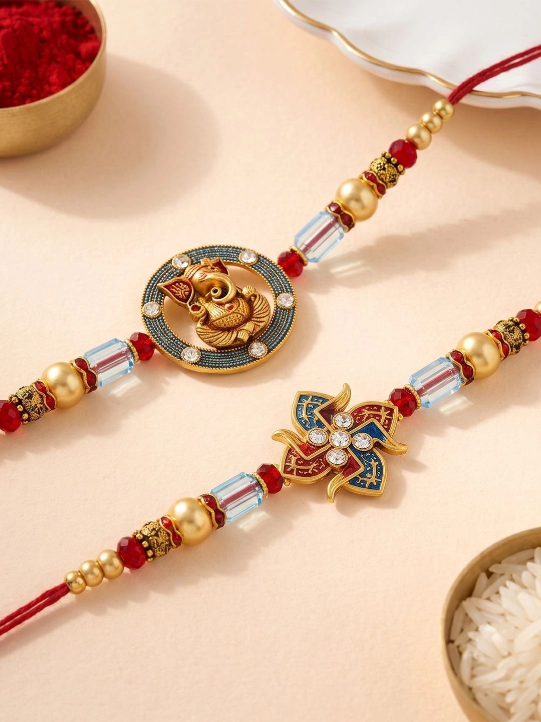 ADIVA Set of 2 Lord Ganesha & Swastik Thread Rakhis with Roli Chawal Meshrei Card-picture-27