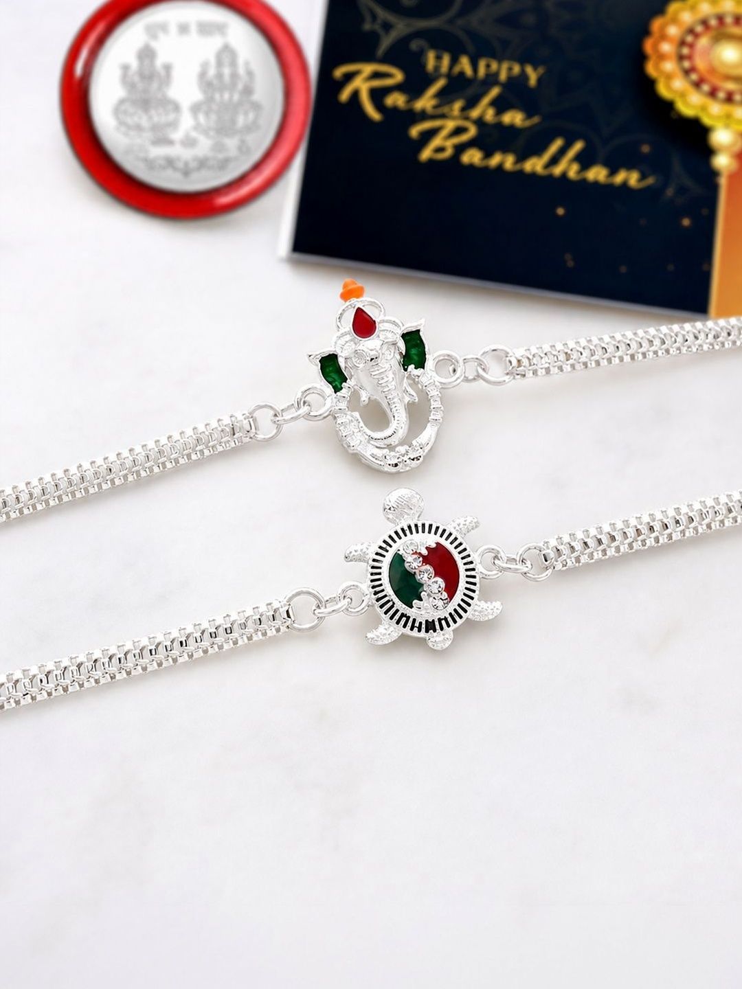 DeoDap Set Of 2 Rakhis With Silver Toned Coin, Roli Chawal & Greeting Card-picture-27