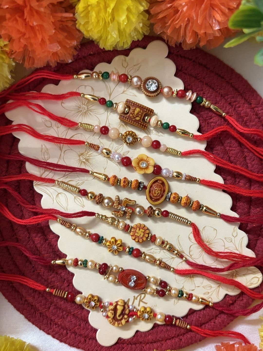 SZN Set Of 10 Multicolor Designer Thread Rakhi With Roli Chawal Chandan Mishri-image-13
