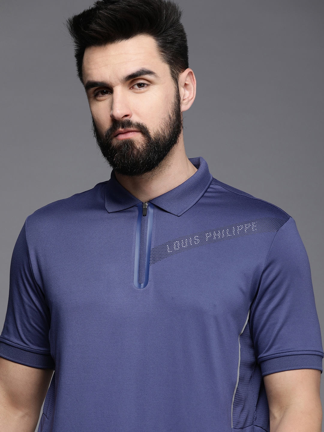 Buy Louis Philippe Athplay Solid Polyester Regular Fit Men's T-Shirt - Blue  at Redfynd