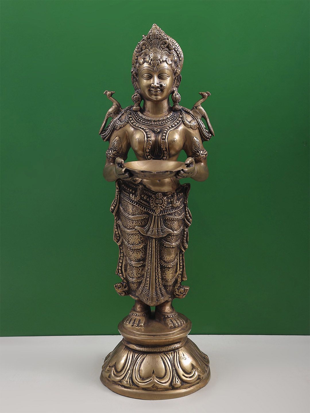 Exotic India Gold Toned Deeplakshmi Brass Showpiece-picture-35