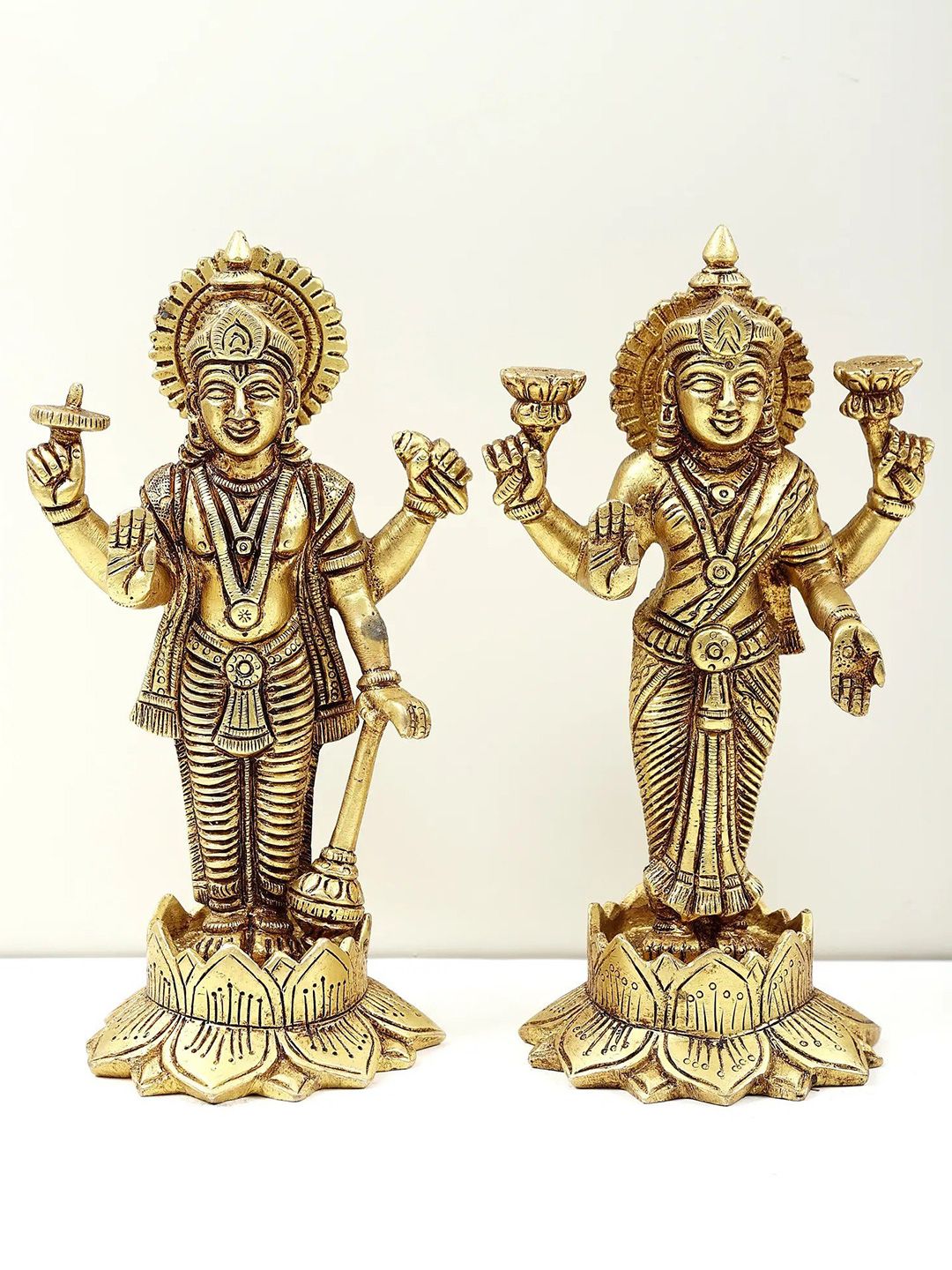 Exotic India Gold-Toned Lord Vishnu and Goddess Lakshmi Standing on Lotus Showpiece-picture-34