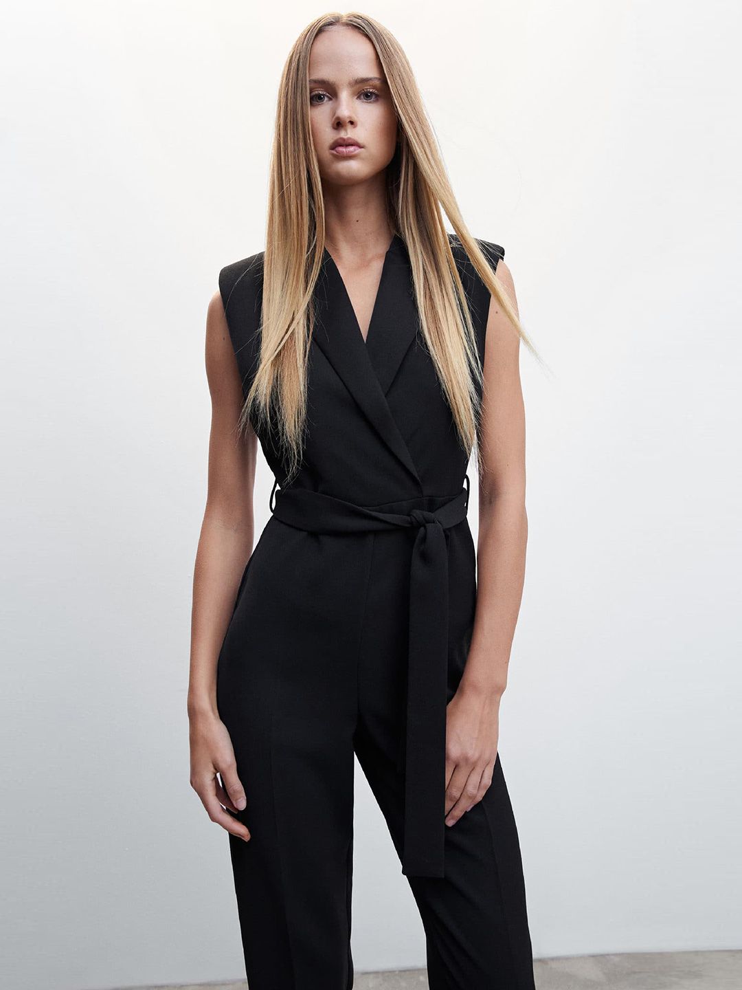 Short jumpsuit with pleat detail