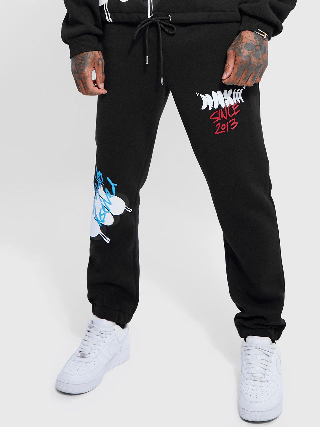 boohooMAN Regular Fit Bubble Graffiti Slit Hem Joggers