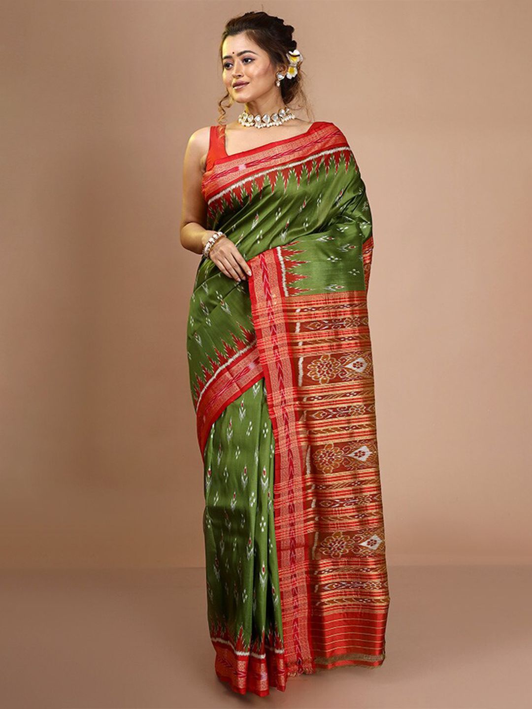 Tvis and Bliss. Onion Pink and Green Pochampally Ikkat Silk Cotton Saree
