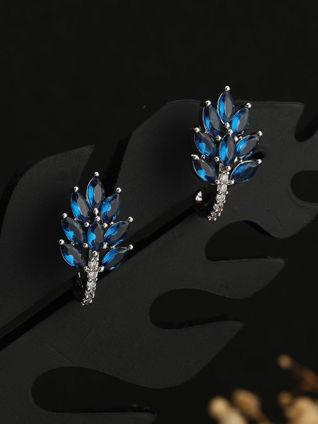 Saraf RS Jewellery Silver-Plated AD-Studded Leaf Shaped Studs Earrings-image-44