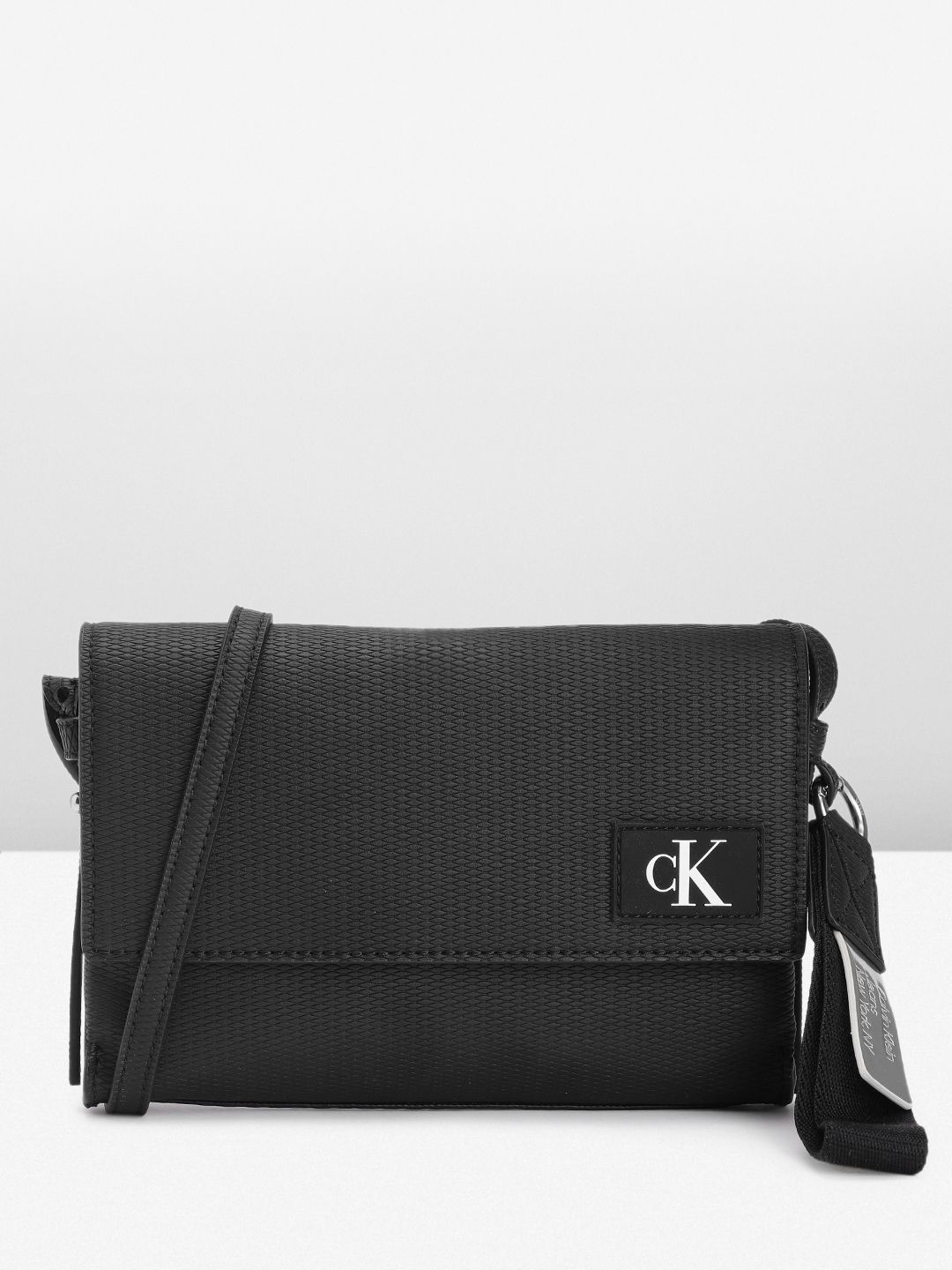 Calvin Klein Finley Logo Crossbody Bag in Gray