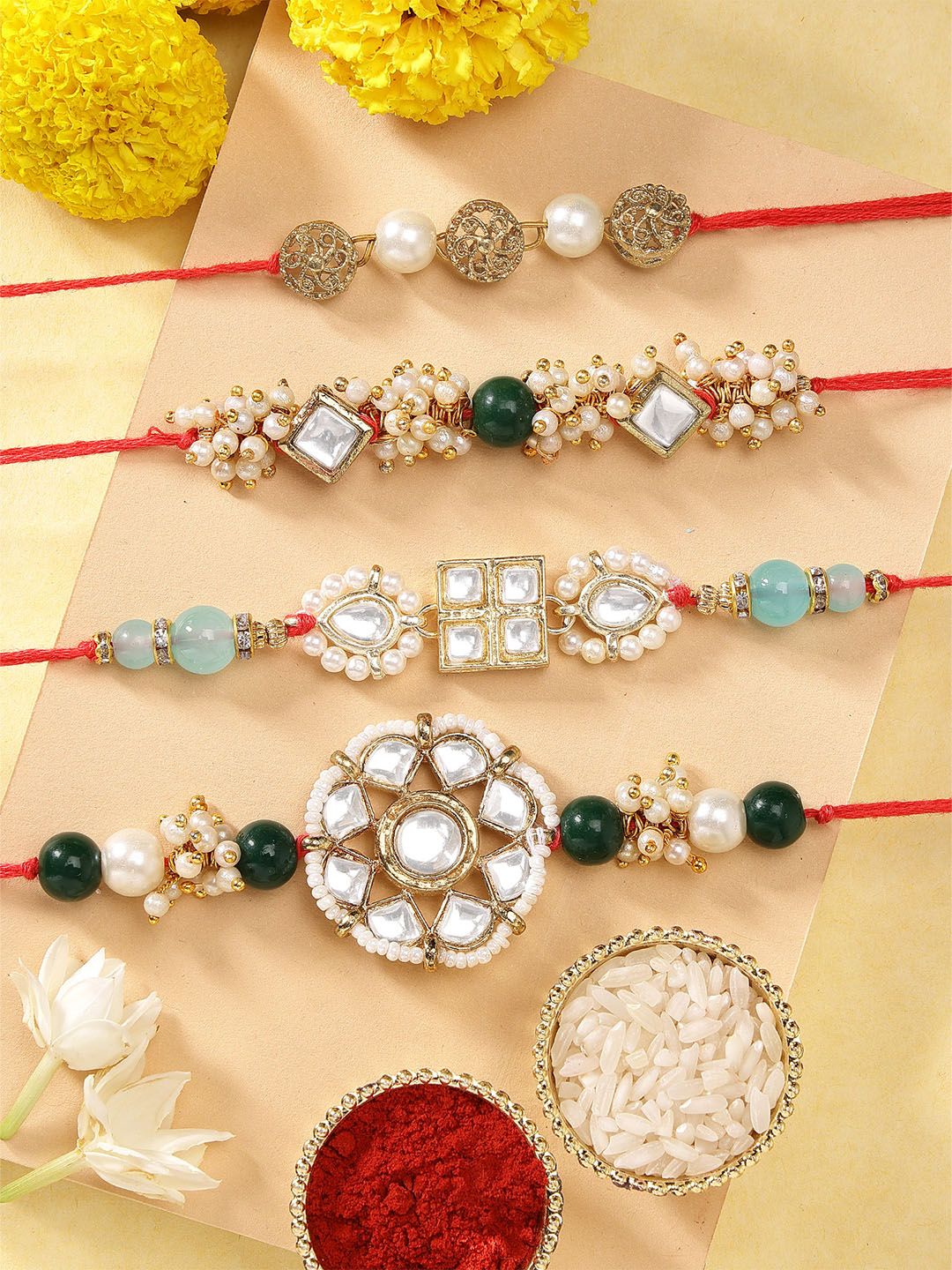 KARATCART Set of 4 Gold-Plated Kundan-Studded Rakhi With Roli Chawal-picture-11