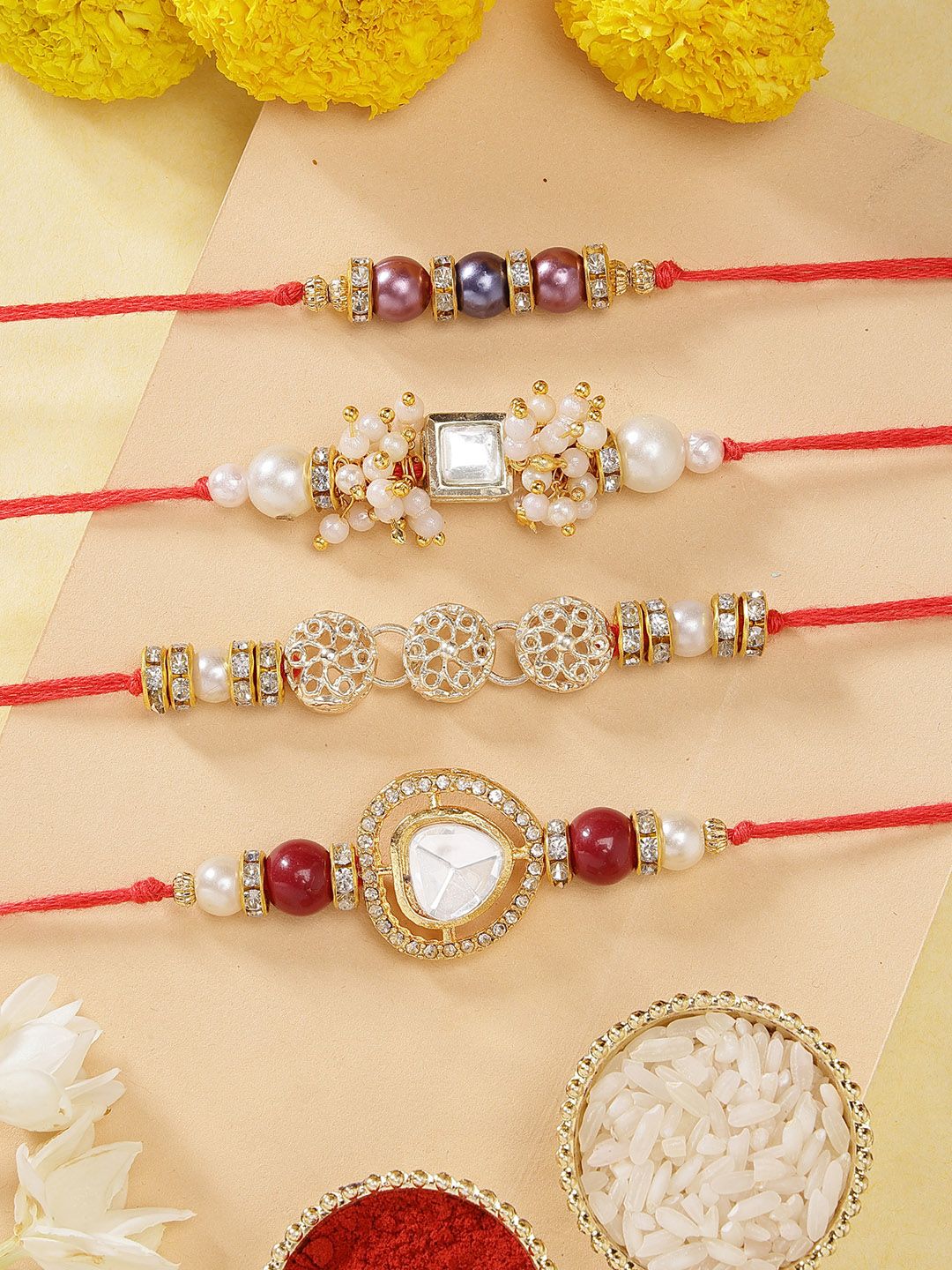 KARATCART Set of 4 Gold-Plated Kundan-Studded Rakhi With Roli Chawal-picture-43