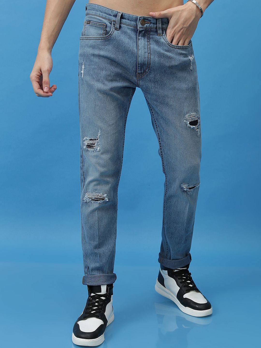 HIGHLANDER Men Blue Tapered Fit Mid-Rise Mildly Distressed Light Fade ...