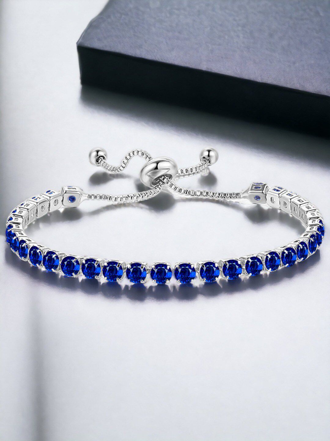 Designs & You Silver Plated Round Cut Cubic Zirconia Blue Matrix Tennis Bracelet-picture-39