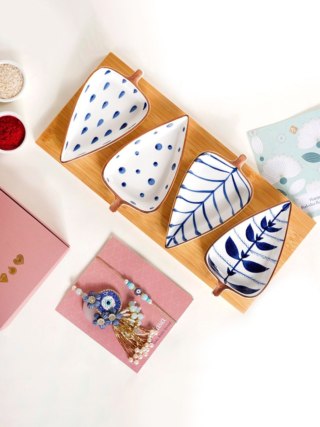 Nestasia Graceful Evil Eye Rakhi With 4 Pcs Platters On Charming Wooden Tray Gift Set-picture-36