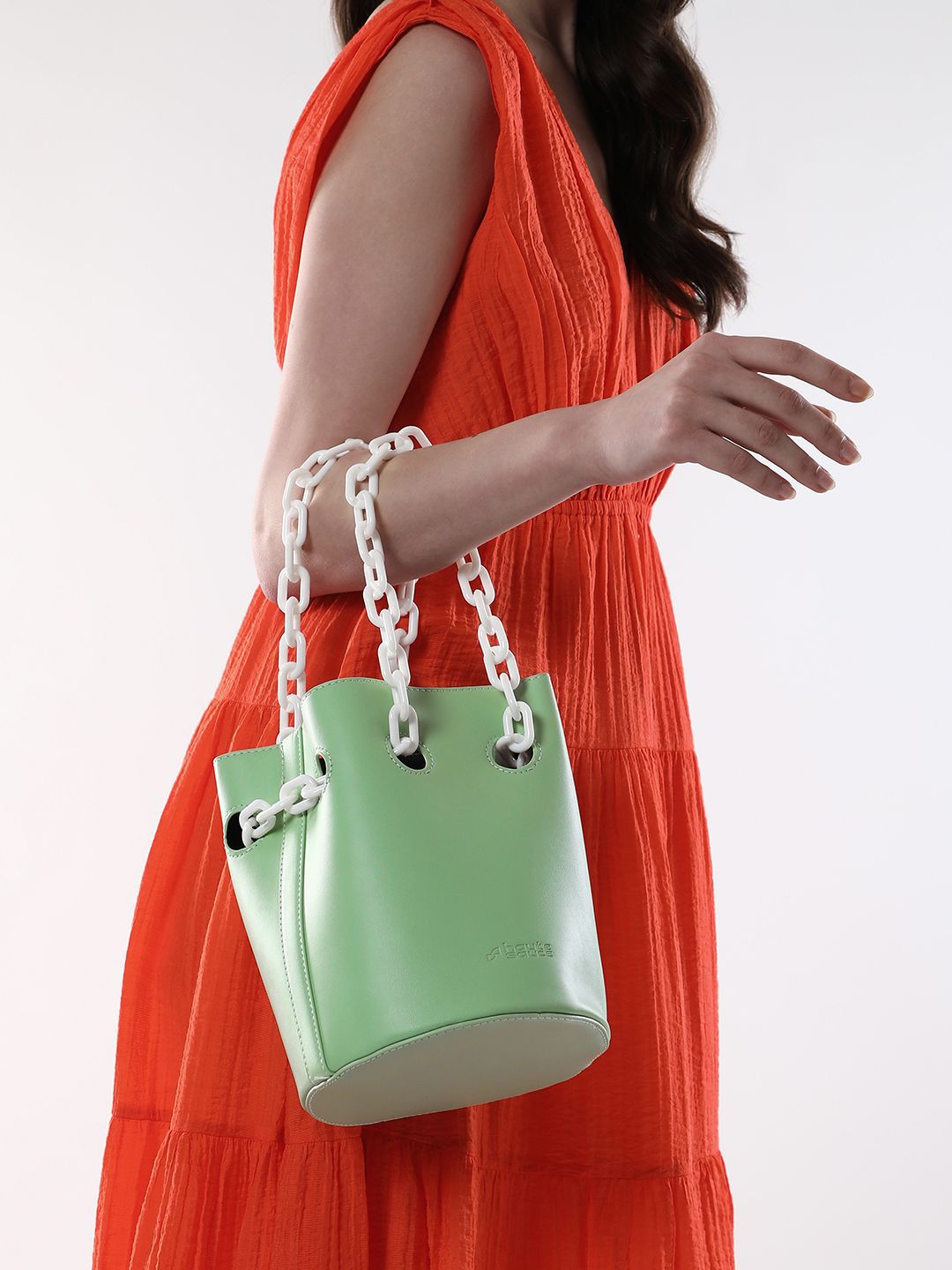 HAUTE SAUCE Green Colourblocked Leather Structured Handheld Bag with Fringed Bucket Chain