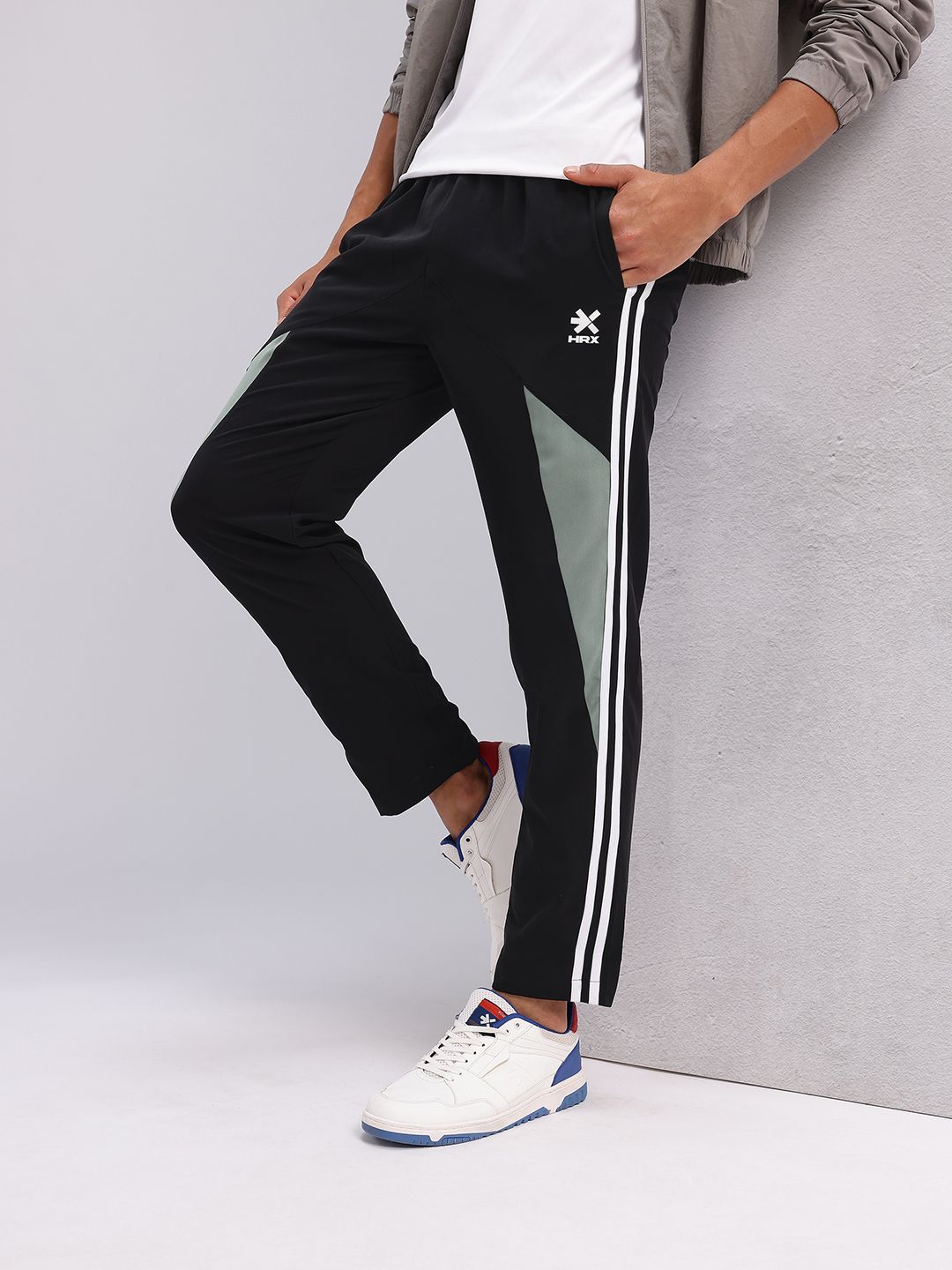 HRX by Hrithik Roshan Men Mid-Rise Colourblocked Lifestyle Track Pants with Side Stripes-image-30