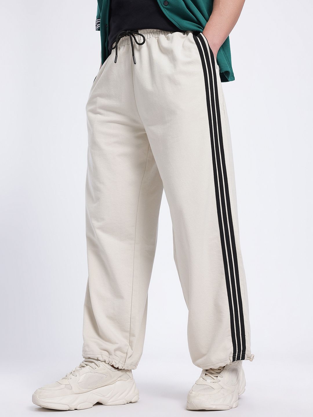 glitchez Men Side Stripes Mid-Rise Baggy Fit Track Pants with Toggle Hem