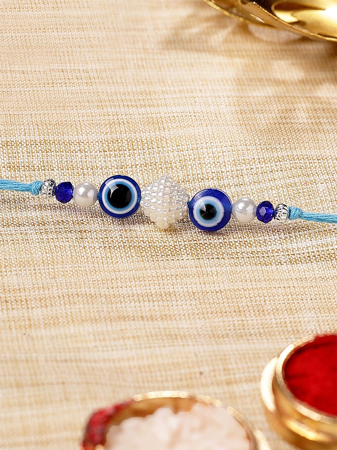 KARATCART Gold Plated Evil Eye Bhaiya Thread Rakhi With Roli Chawal-picture-28