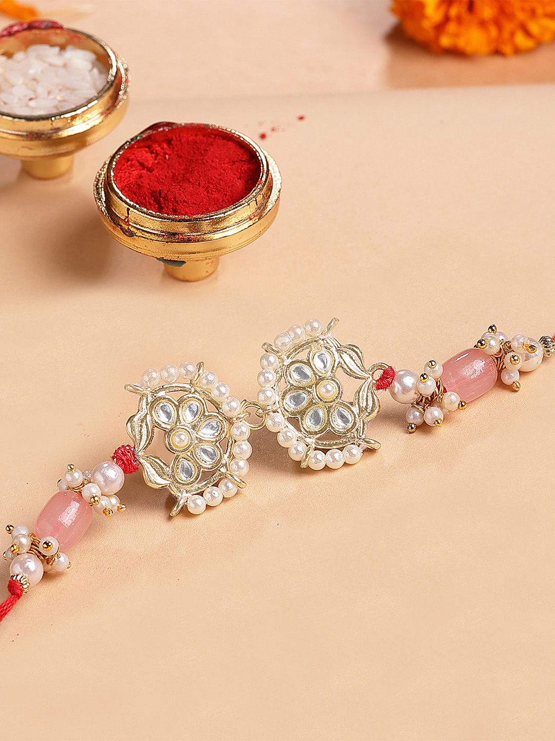 KARATCART Gold Plated Pink Tumble Kundan Bhiya Thread Rakhi with Roli & Chawal-picture-32