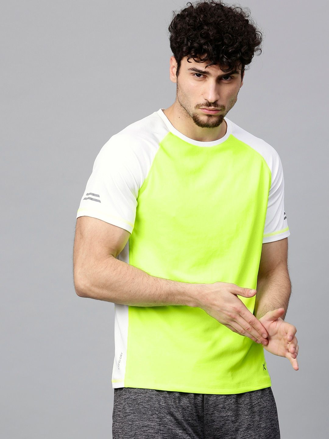 HRX by Hrithik Roshan Men Fluorescent Green Solid Round Neck Running T-shirt