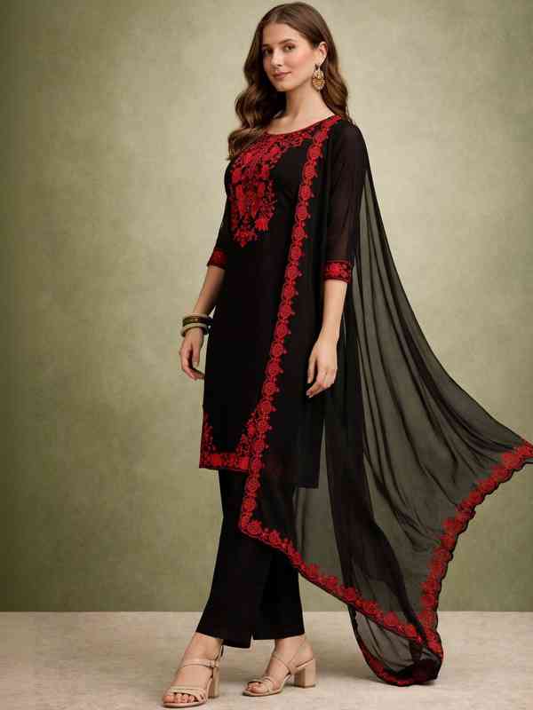 black punjabi dress Black and Gold Embroidered Punjabi Suit  FALAKENOOR