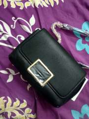 mango solid sling bag