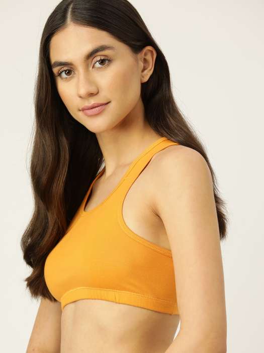 Buy DressBerry DressBerry Mustard Yellow Solid Sports Bra at Redfynd