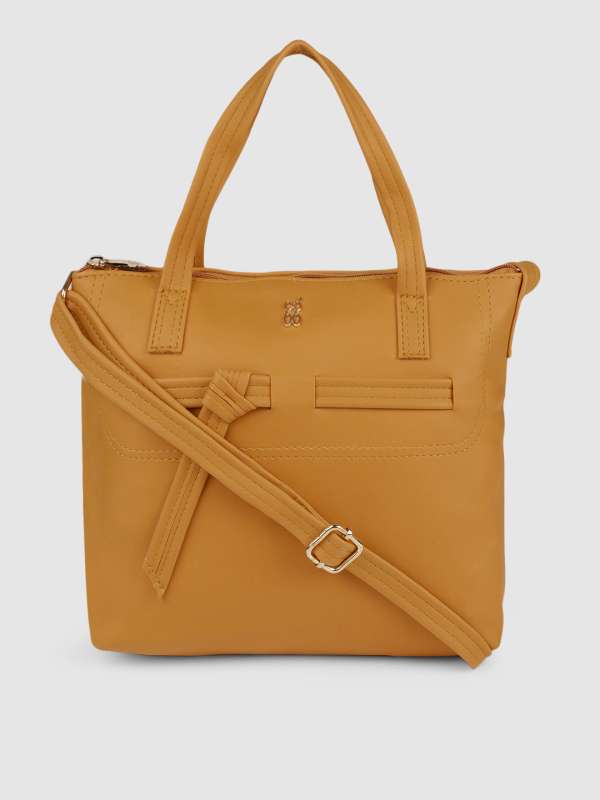 round sling bag myntra
