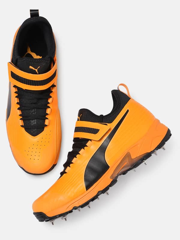 puma orange cricket shoes