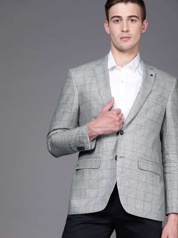 navy suit jacket grey trousers