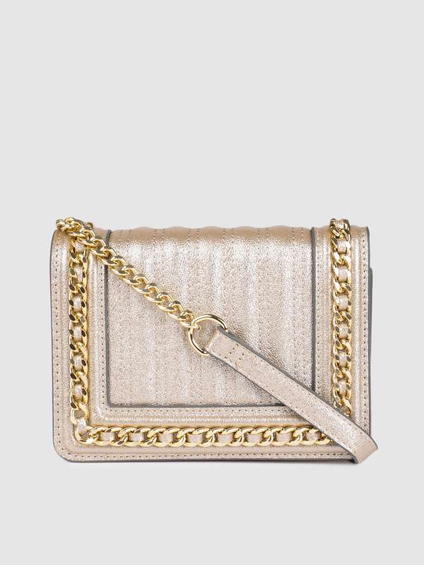 accessorize gold bag