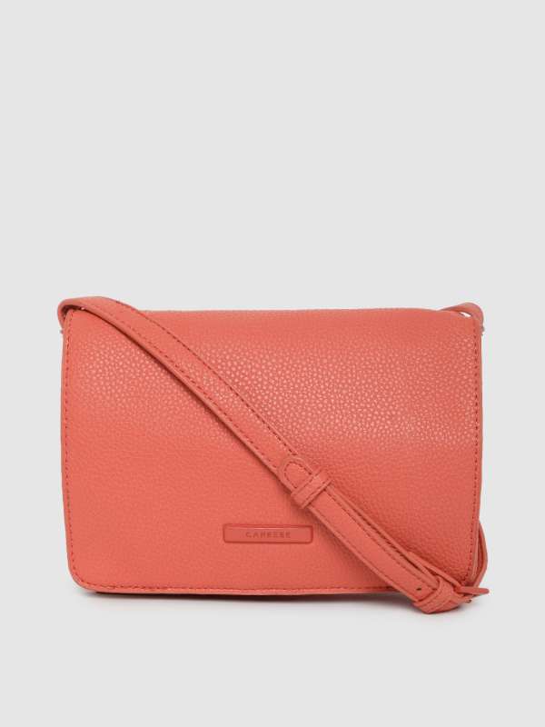 caprese pink solid sling bag