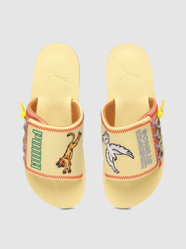 puma yellow slippers