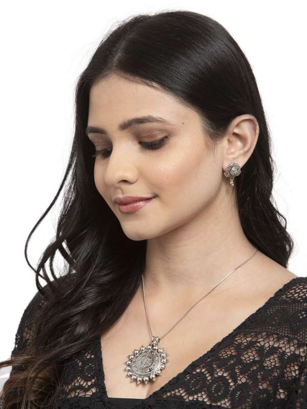 Peacock online shaped earrings