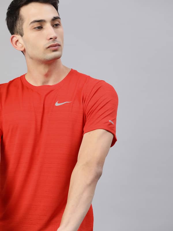 lime green and red nike shirt