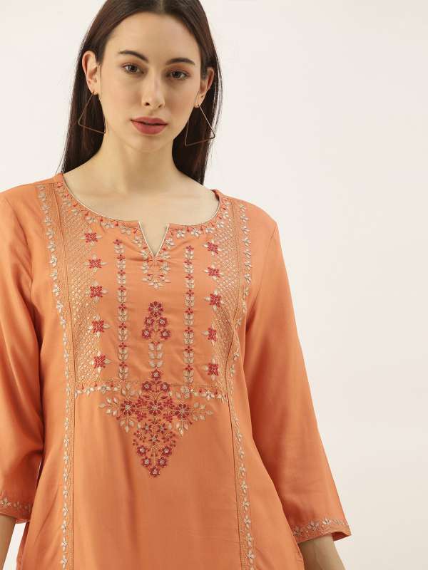 Orange top colour kurtis