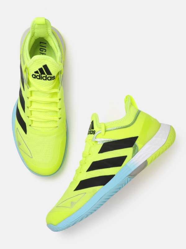 fluorescent green tennis shoes