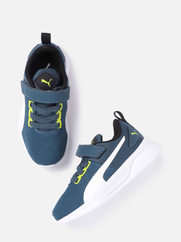 white puma velcro shoes