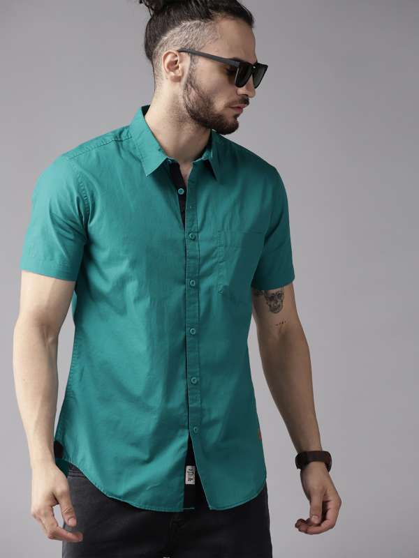 teal green shirt