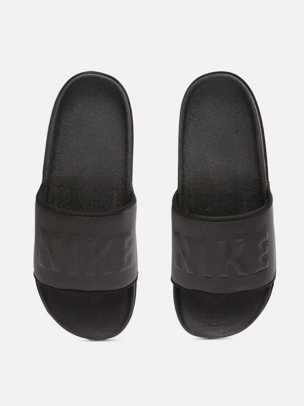 all black nike slippers