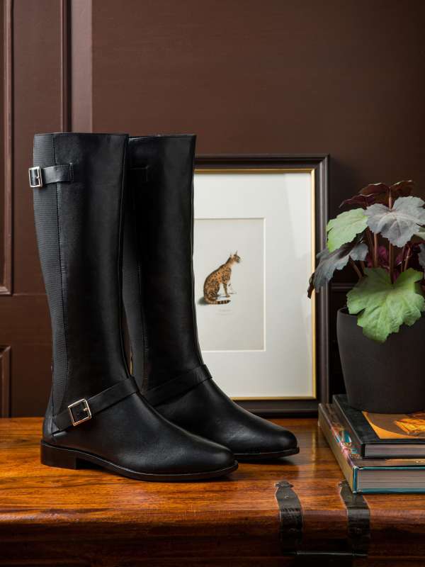 Knee length shop boots myntra