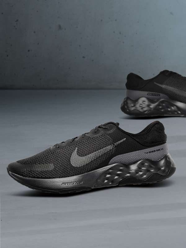 Nike running renew arena sneakers in black deals