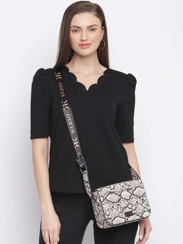 Box top sling bags