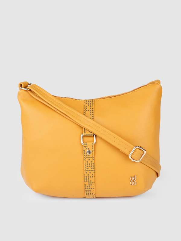 Baggit mustard yellow solid sling bag 2025